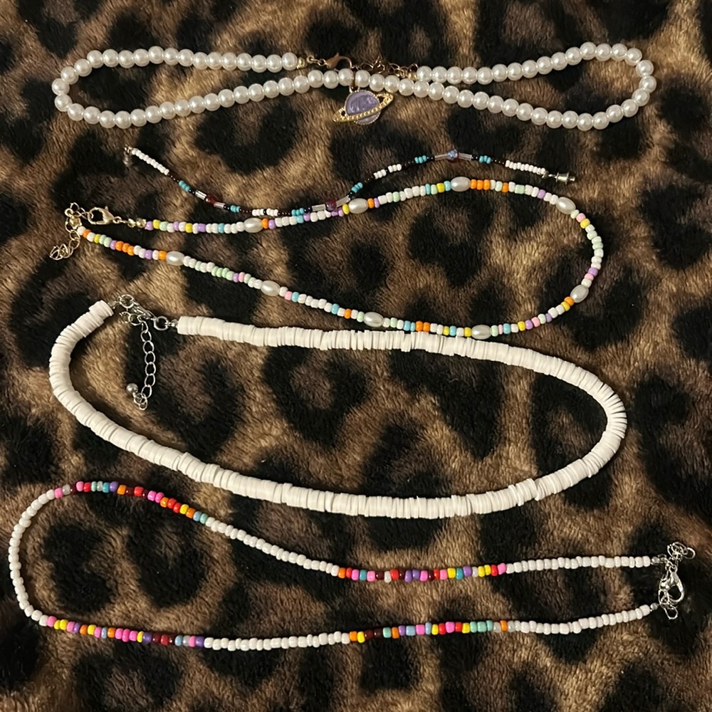 4 necklaces, 1 bracelet!